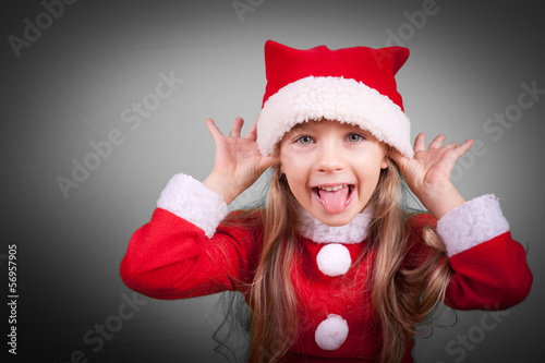 Photo: bambina con costume di natale bambina con costume di natale