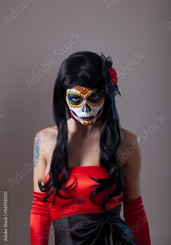 Photo: Sugar skull girl with red rose Sugar skull girl with red rose