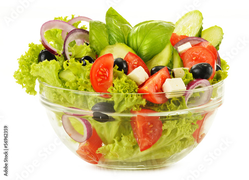 Photo: Vegetable salad bowl isolated on white Vegetable salad bowl isolated on white