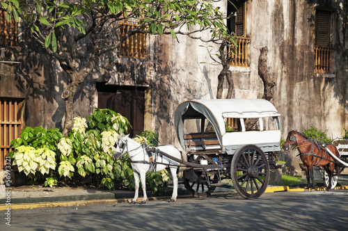 Photo: Horse Drawn Calesas waiting for tourists in Manila. Horse Drawn Calesas waiting for tourists in Manila.