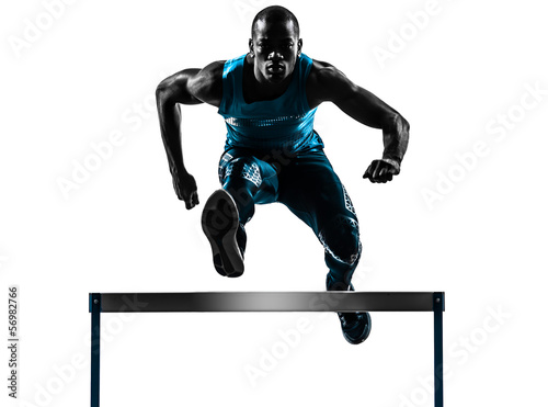 Photo: man hurdler runner silhouette man hurdler runner silhouette