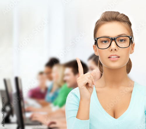 Photo: attractive student wearing glasses in college attractive student wearing glasses in college