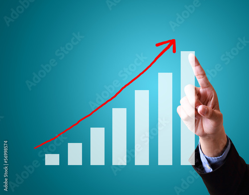 Photo: businessman with financial symbols coming from hand businessman with financial symbols coming from hand