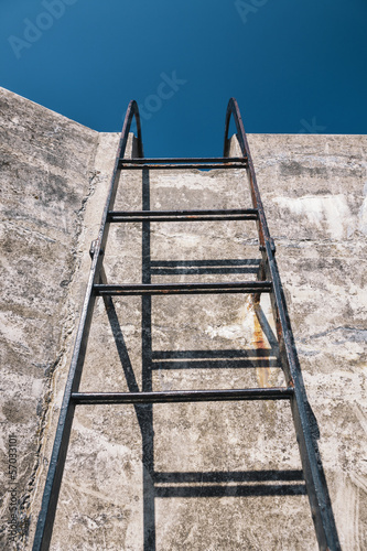 Photo: Concrete wall and ladder Concrete wall and ladder
