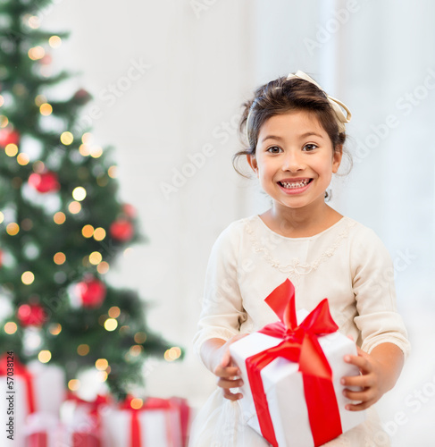 Photo: happy child girl with gift box happy child girl with gift box