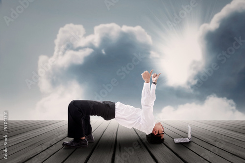 Photo: Acrobatic Businessman Acrobatic Businessman
