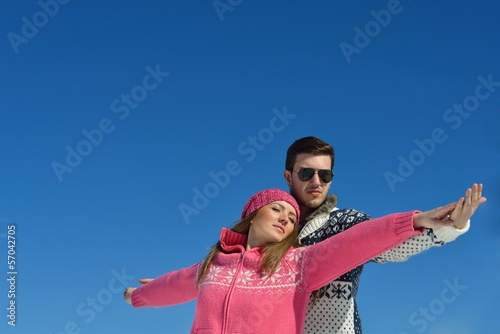 Photo: Young Couple In Winter Snow Scene Young Couple In Winter Snow Scene
