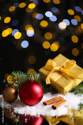 Photo: Beautiful Christmas composition on table on bright background Beautiful Christmas composition on table on bright background