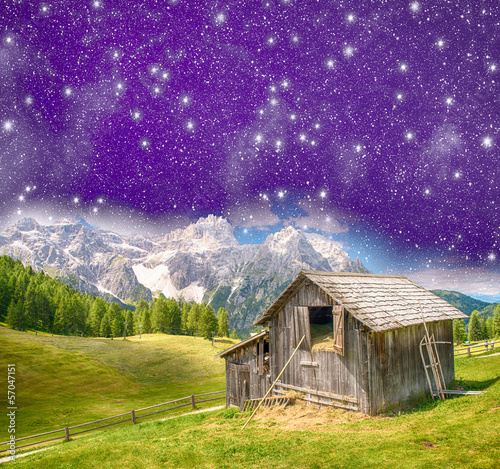 Photo: Hut on mountain landscape at night Hut on mountain landscape at night
