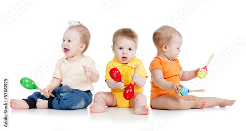 Photo: Children playing with musical toys Children playing with musical toys