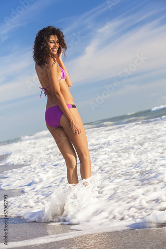 Photo: Rear View Beautiful Bikini Woman At Beach Rear View Beautiful Bikini Woman At Beach