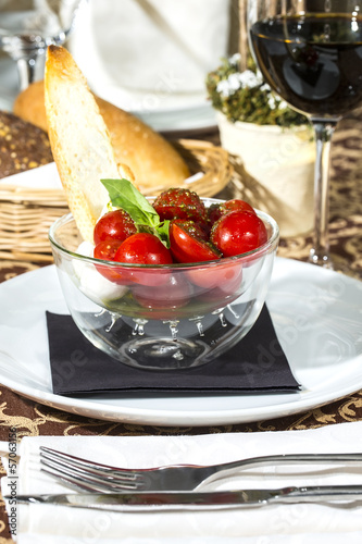 Photo: tomatoes and cheese in a glass bowl tomatoes and cheese in a glass bowl
