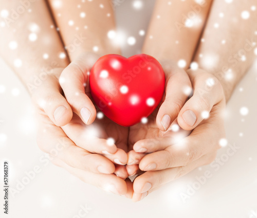 Photo: woman and man hands with heart woman and man hands with heart