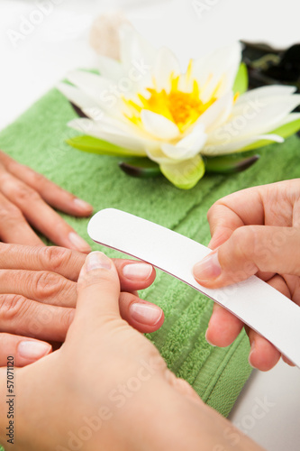 Photo: Beautician Polishing The Nails Beautician Polishing The Nails