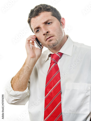 Photo: Young Attractive Man talking on the phone Young Attractive Man talking on the phone