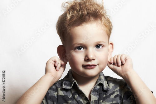 Photo: child. funny little boy. close-up. joy. 4 eyers old. military child. funny little boy. close-up. joy. 4 eyers old. military