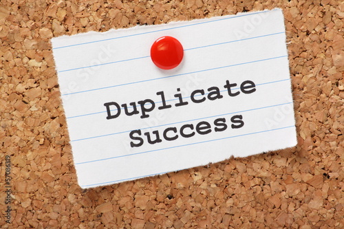Photo: Duplicate Success on a paper note pinned to a cork board Duplicate Success on a paper note pinned to a cork board