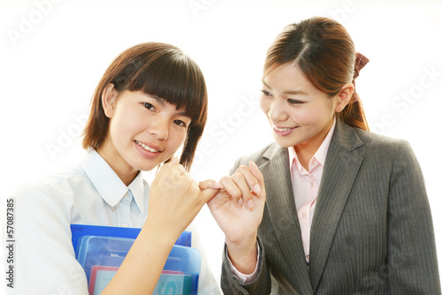 Photo: 笑顔の女生徒と教師 笑顔の女生徒と教師