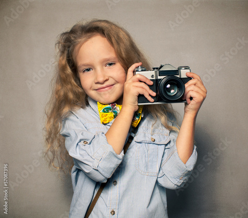 Photo: Child with camera. Child with camera.