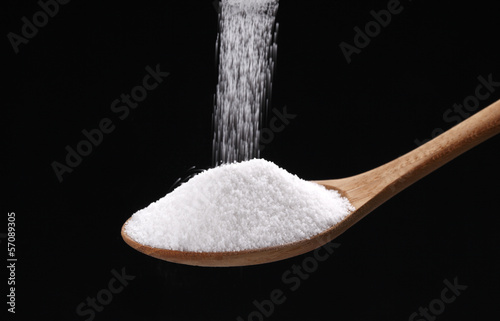Photo: Sugar or Salt on spoon Sugar or Salt on spoon