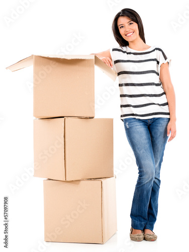 Photo: Woman packing in boxes Woman packing in boxes