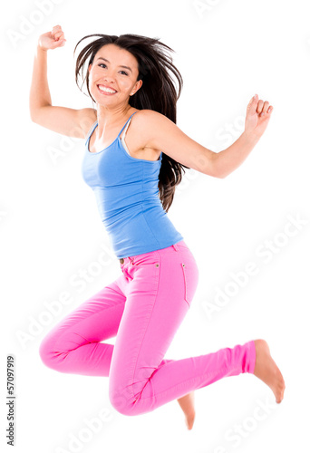 Photo: Happy woman jumping Happy woman jumping
