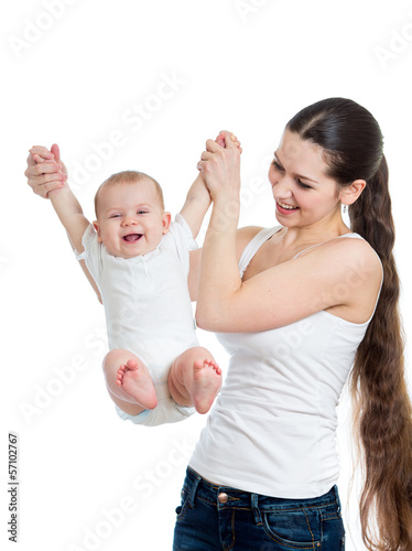 Photo: cute mother playing with her baby isolated cute mother playing with her baby isolated