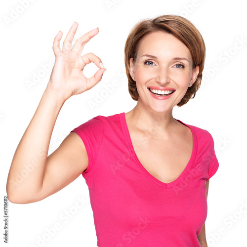 Photo: Adult happy woman with ok gesture Adult happy woman with ok gesture