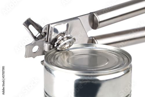 Photo: Tin opener opening a can Tin opener opening a can