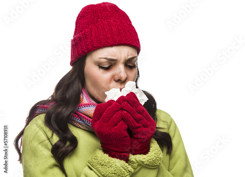 Photo: Sick Mixed Race Woman Blowing Her Sore Nose with Tissue. Sick Mixed Race Woman Blowing Her Sore Nose with Tissue.