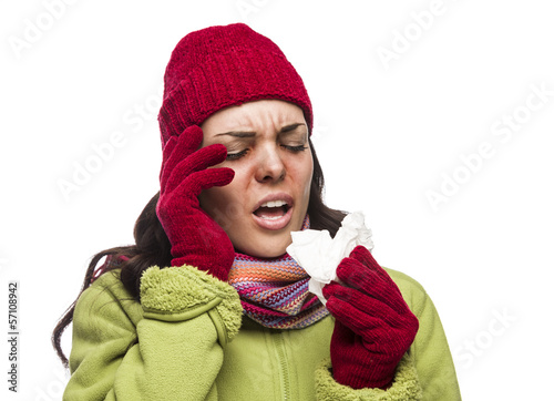 Photo: Sick Mixed Race Woman Blowing Her Sore Nose with Tissue. Sick Mixed Race Woman Blowing Her Sore Nose with Tissue.