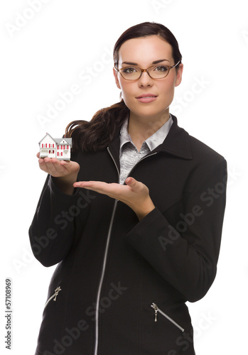 Photo: Mixed Race Businesswoman Holding Small House to the Side. Mixed Race Businesswoman Holding Small House to the Side.