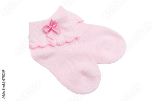 Photo: Pink baby socks isolated on white Pink baby socks isolated on white