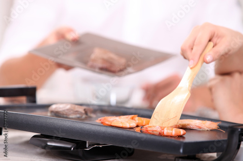 Photo: Cooking prawns on a table top stove Cooking prawns on a table top stove