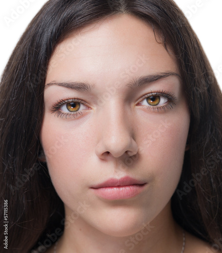 Photo: Close-up portrait of beautiful young woman. Close-up portrait of beautiful young woman.