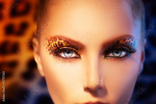 Photo: Beauty Fashion Model Girl with Holiday Leopard Makeup Beauty Fashion Model Girl with Holiday Leopard Makeup