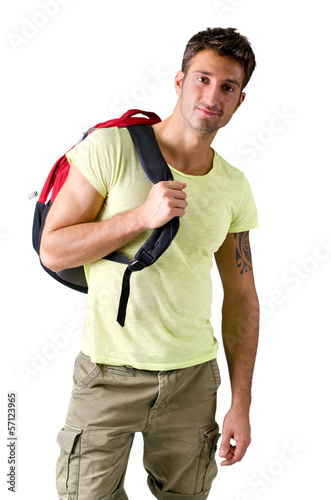 Photo: Handsome young man with backpack, isolated on white Handsome young man with backpack, isolated on white