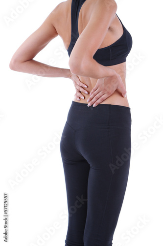 Photo: Back pain in young girls isolated on white Back pain in young girls isolated on white