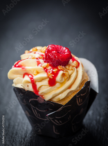 Photo: Delicious vanilla cupcake with raspberry Delicious vanilla cupcake with raspberry