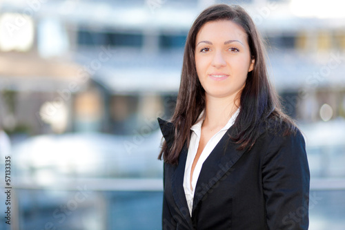 Photo: Smiling businesswoman outdoor Smiling businesswoman outdoor