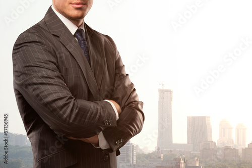 Photo: businessman and buildings businessman and buildings