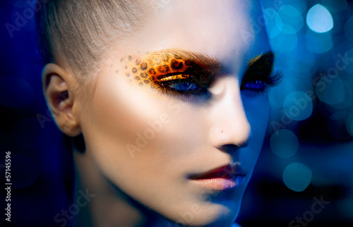 Photo: Beauty Fashion Model Girl with Holiday Leopard Makeup Beauty Fashion Model Girl with Holiday Leopard Makeup