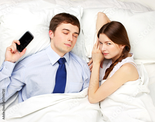 Photo: businessman and woman in bed businessman and woman in bed