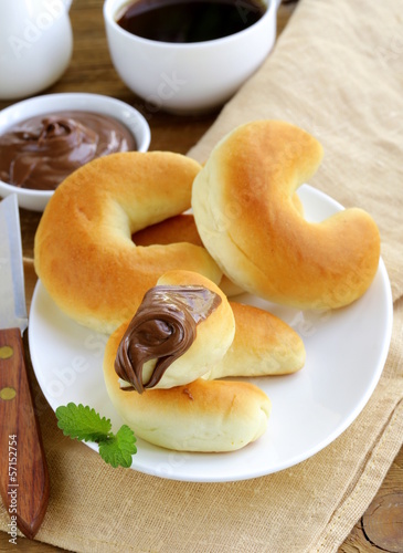 Photo: Chocolate nut paste (nutella) for breakfast with bread rolls Chocolate nut paste (nutella) for breakfast with bread rolls