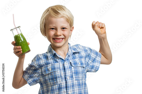 Photo: Boy with green smoothie flexing muscles Boy with green smoothie flexing muscles