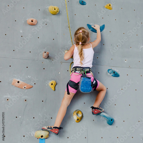 Photo: Little Girl Climbing Rock Wall Little Girl Climbing Rock Wall