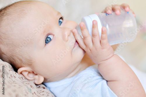 Photo: baby with water baby with water