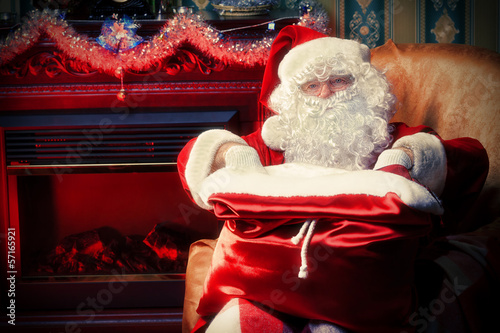 Photo: sitting in armchair sitting in armchair