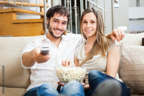 Photo: Couple watching a movie Couple watching a movie