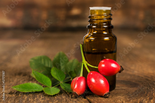 Photo: bottle of essential oil of rose hips bottle of essential oil of rose hips